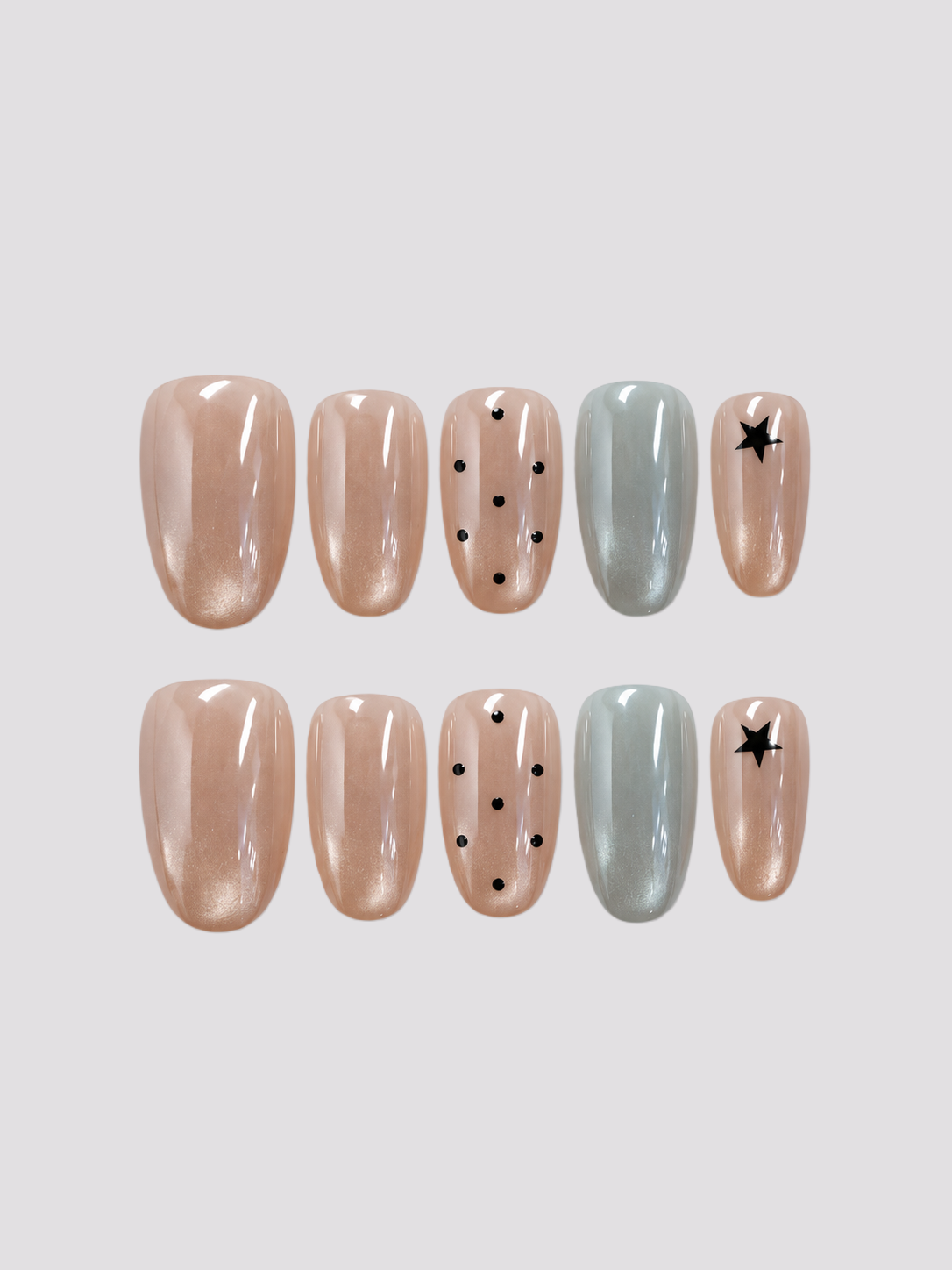 Icy Dots short oval press-on nails – worn on hands