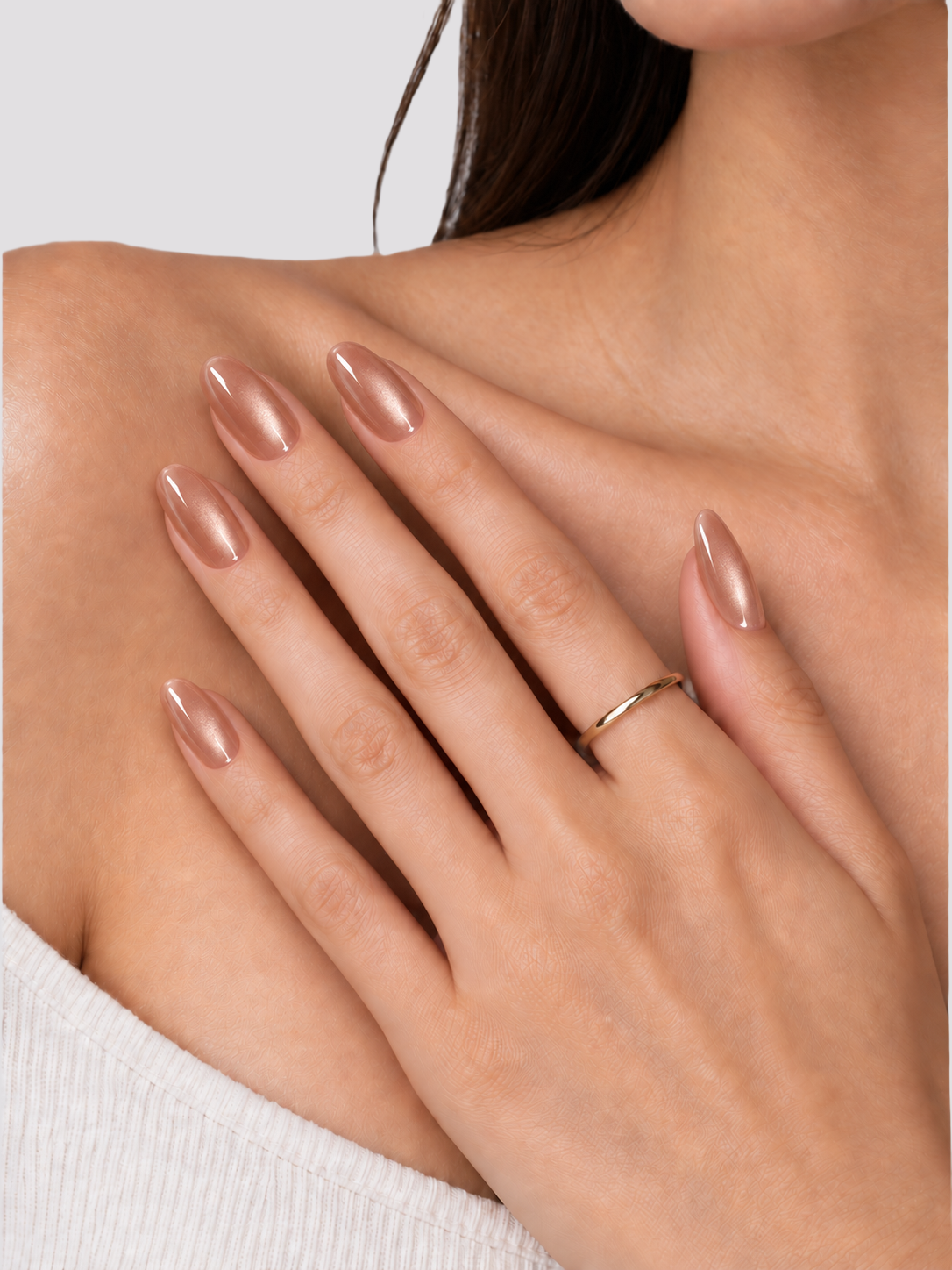 Peach Glow medium oval press-on nails – worn on hands