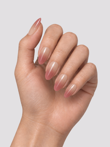 Nude Illusion medium oval press-on nails – worn on hands