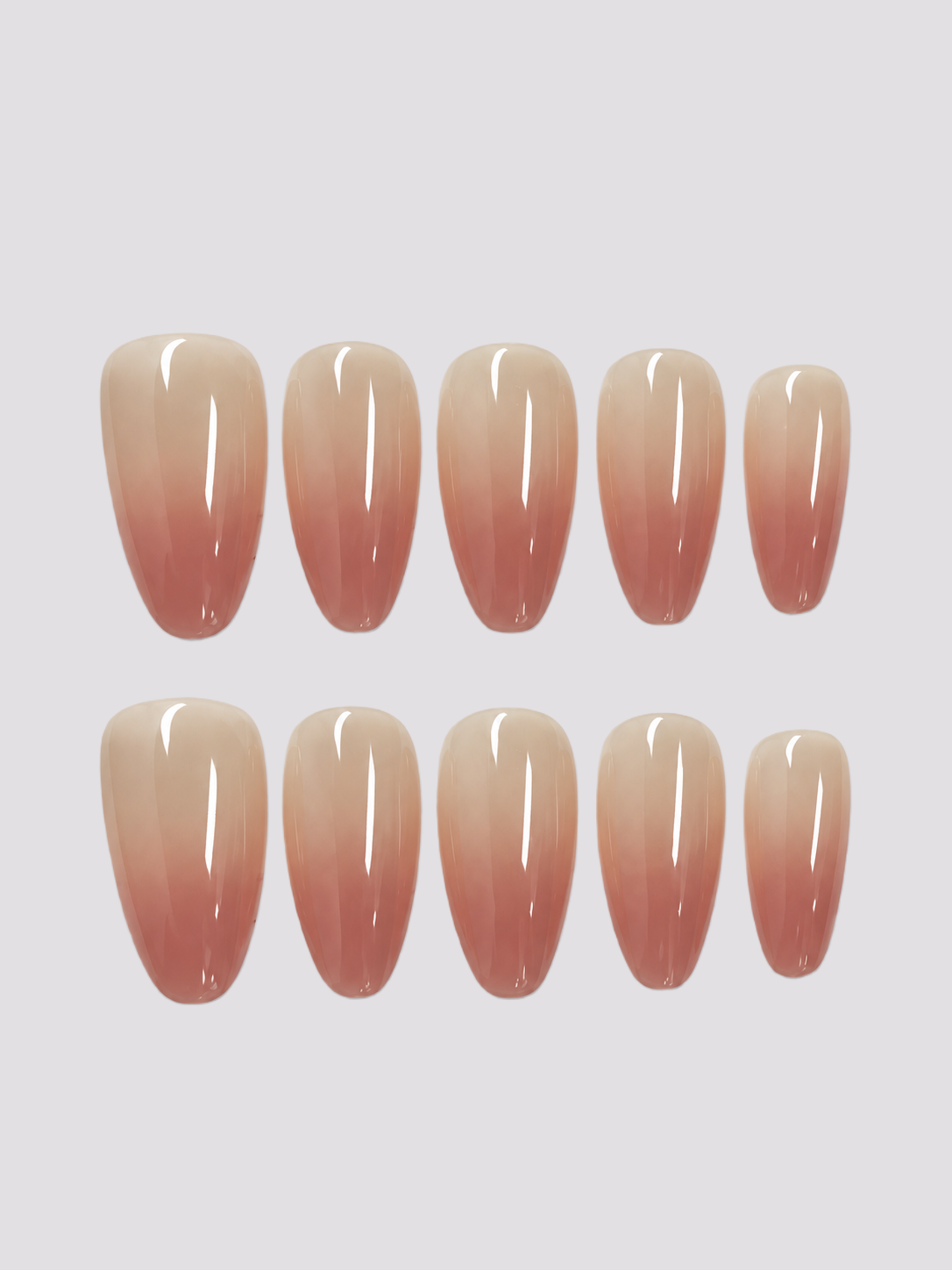 Nude Illusion medium oval press-on nails – worn on hands