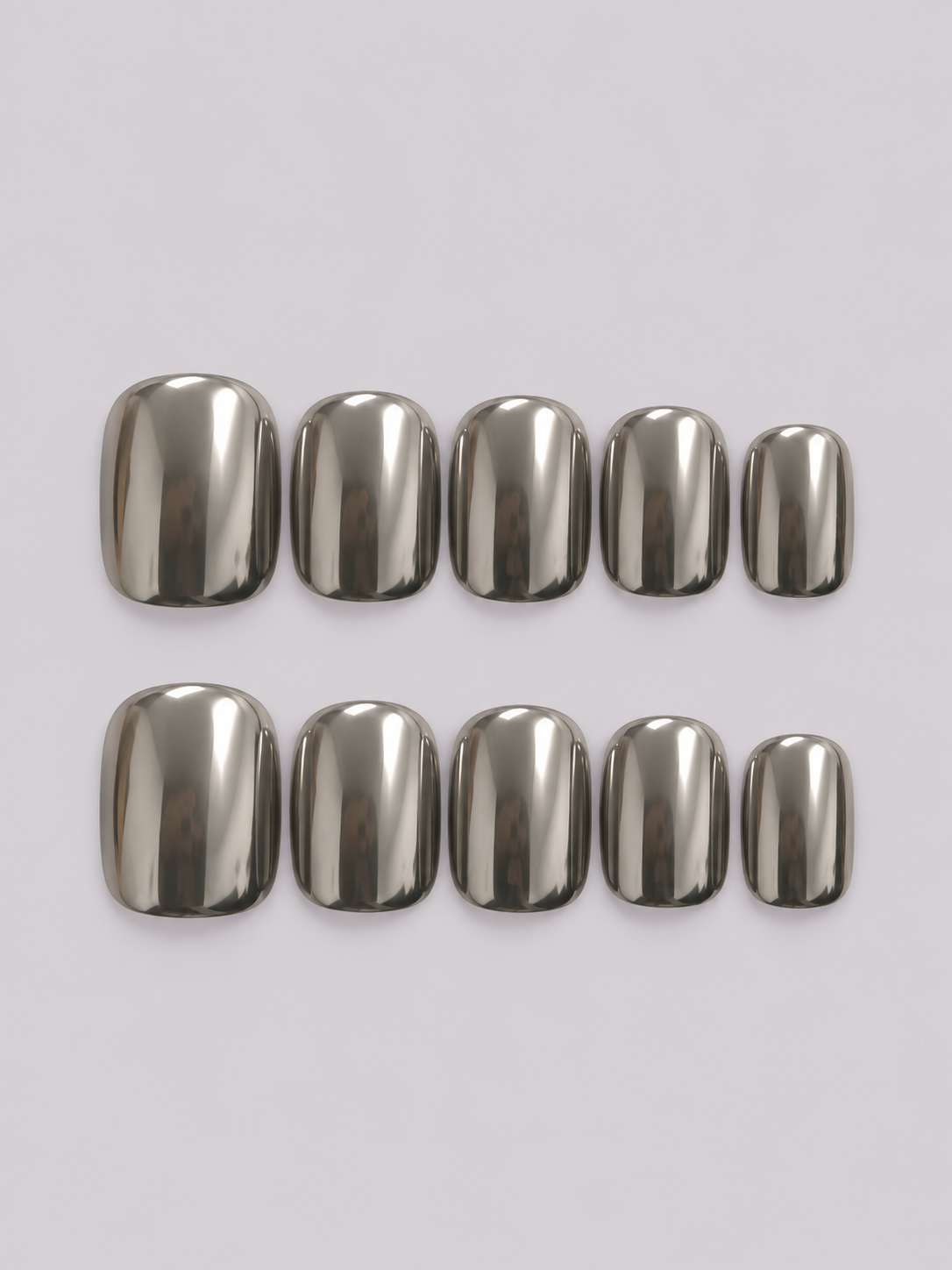 Molten Silver press-on nail set with a reflective silver mirror finish, arranged in two rows.