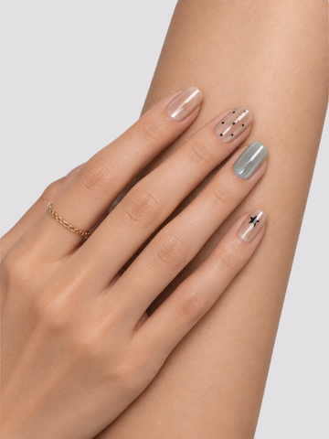 Icy Dots short oval press-on nails – worn on hands