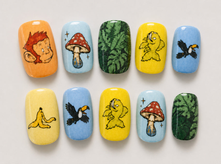 CLAWT x Dario Merlo press-on nail set with colourful monkey, mushroom, bird, banana and leafy jungle illustrations.